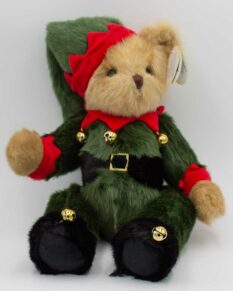 Stuffed plush bear with elf outfit and jingle bells