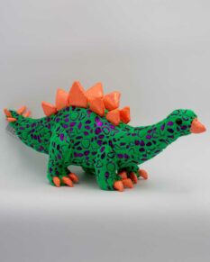 Foil-spotted green and orange stegosaurus stuffed plush toy from Wild Republic