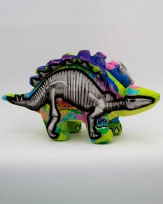 Graffiti covered stegosaurus stuffed plush toy from Wild Republic