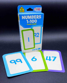 Numbers 1-100 flash cards set with cards saying "99", "6", and "47" in front.